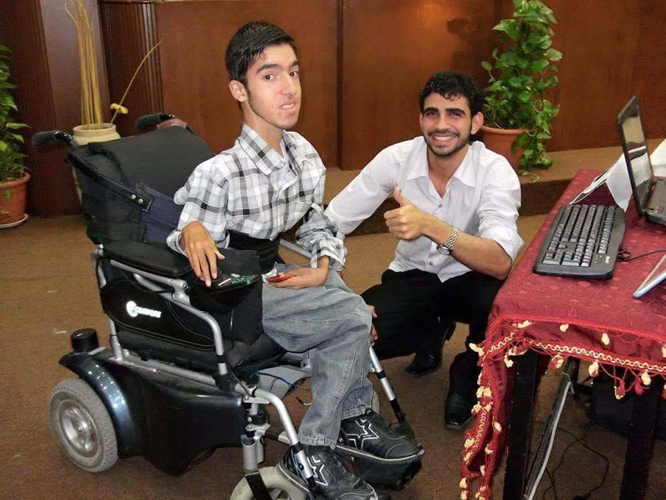 Ameer in a wheelchair