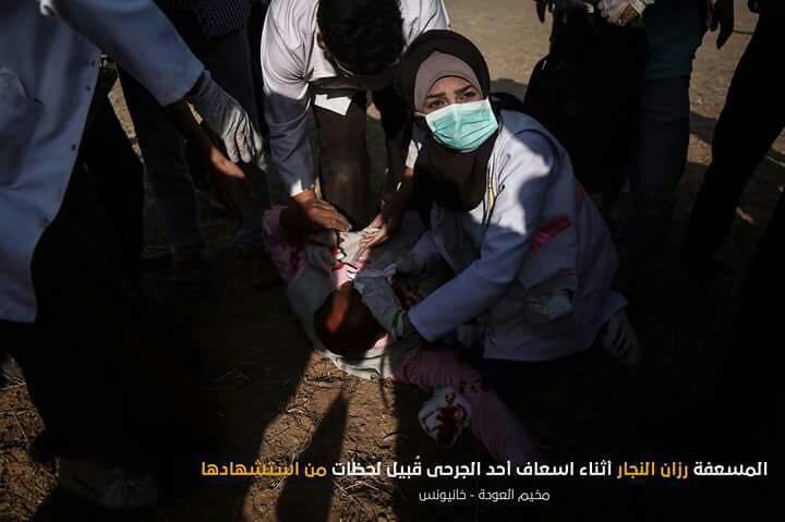 Razan Alnajjar treating the wounded 