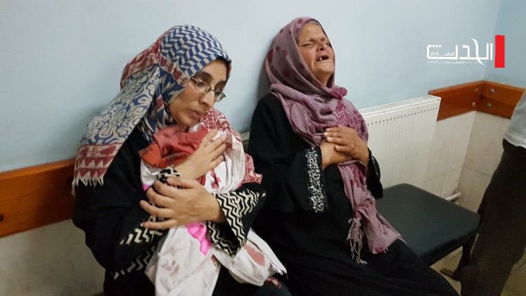 At the hospital, Razan’s mother hugged her uniform
