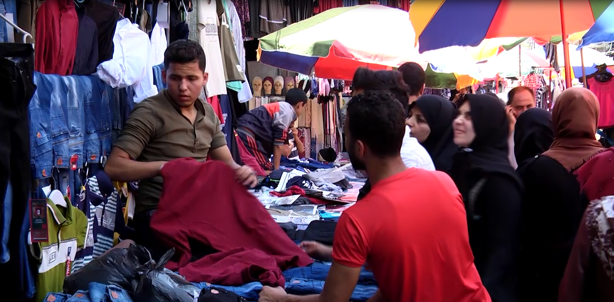 Gaza men shopping for Eid clothes