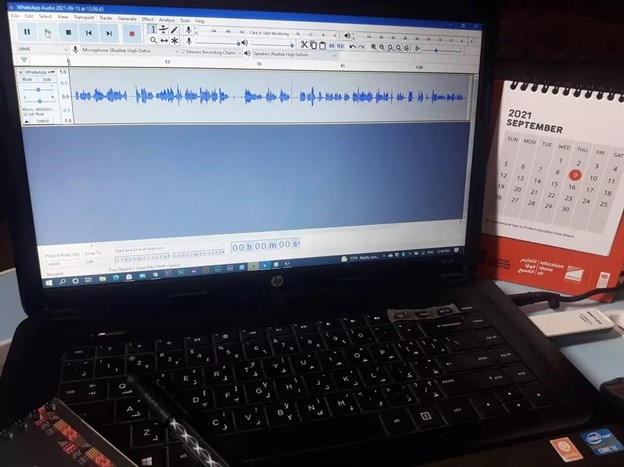 laptop monitor showing audio file