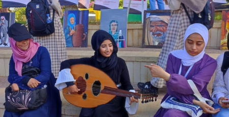 Suhair al-Shawi while performing Palestinian music.