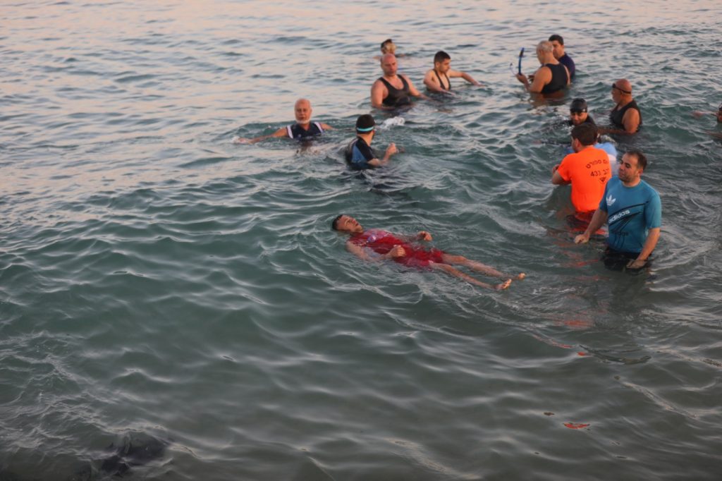 Swimmers in the Gaza sea.