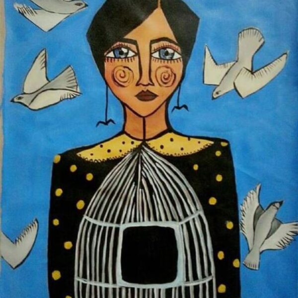 Woman with doves flying around her.