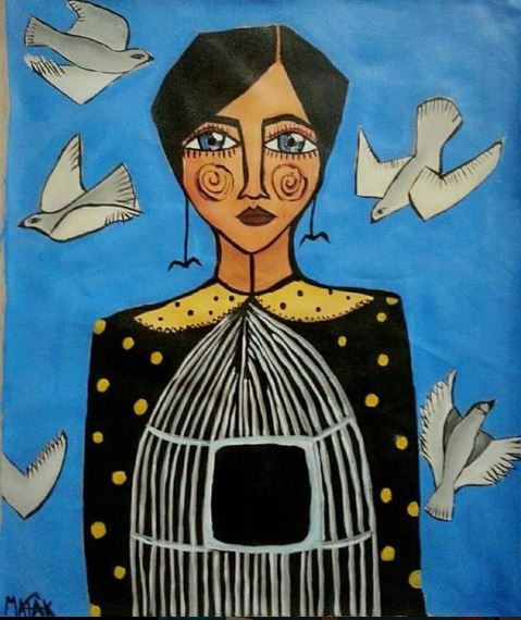 Woman with doves flying around her.