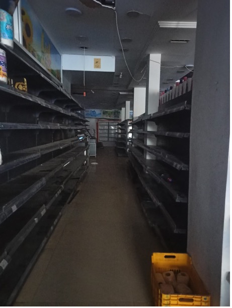 Empty supermarket shelves.