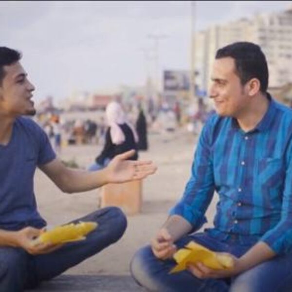 Two men on Gaza beach.