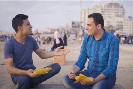 Two men on Gaza beach.