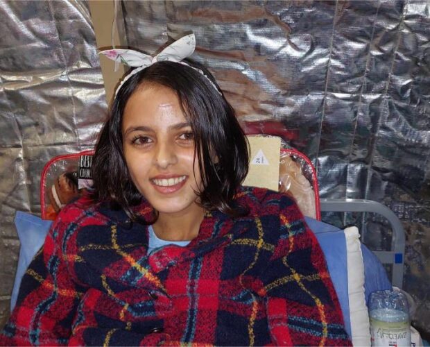 12-year-old girl in hospital bed.