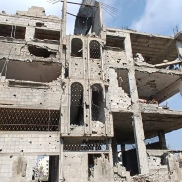 A damaged multi-family building in Gaza.