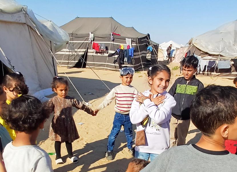Children playing in displaced persons' camp.
