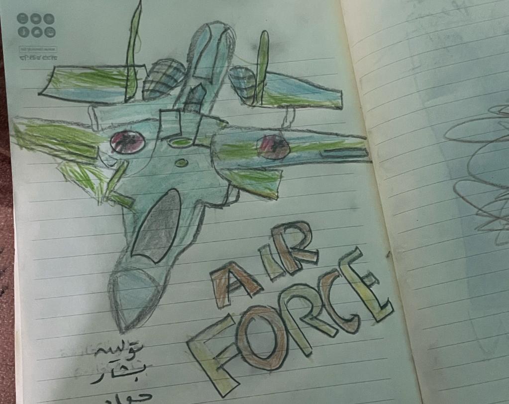 Child's drawing of a jet with the words "Air Force" on the page.